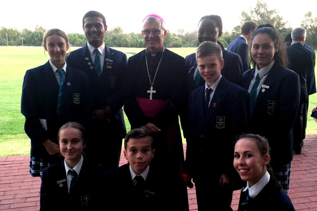 Archbishop Costelloe with students from Emmanuel College at the opening of the new Sport and Performing Arts Centre on Wednesday April 6. Photo: Jamie O’Brien.