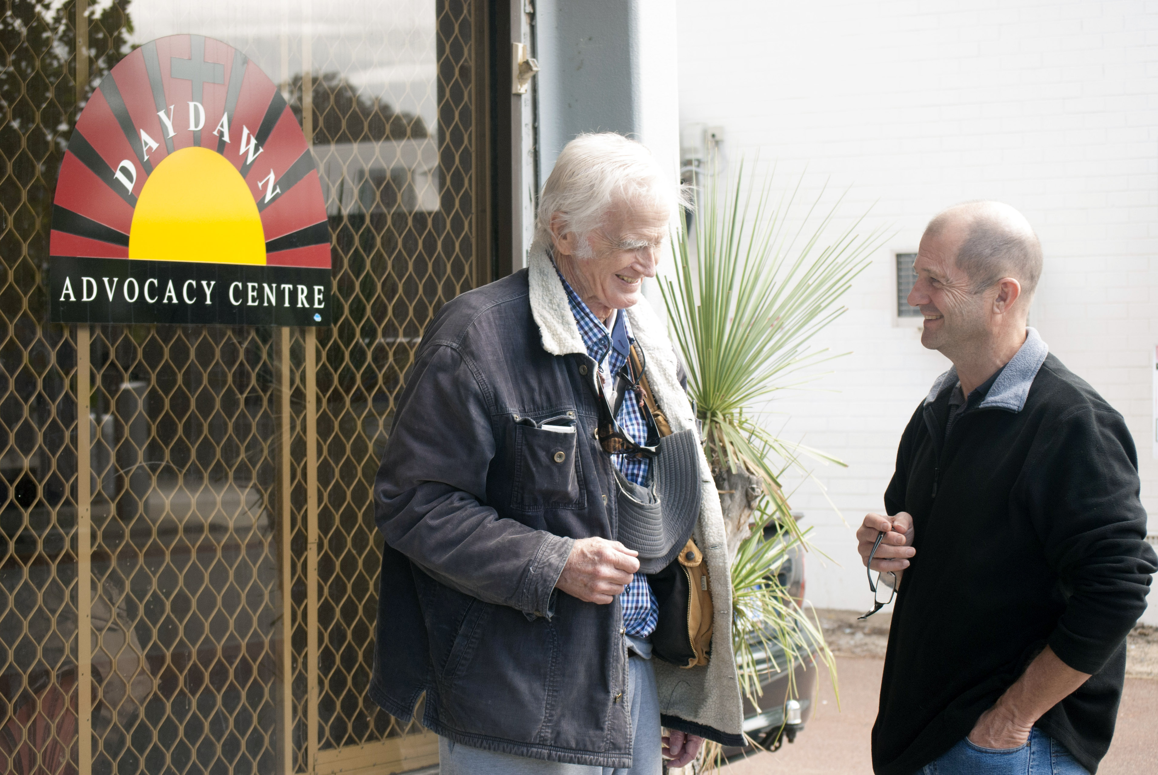 Daydawn Advocacy Centre volunteer David Buchanan and Director Mark Reidy share a laugh. Photo: Rachel Curry.