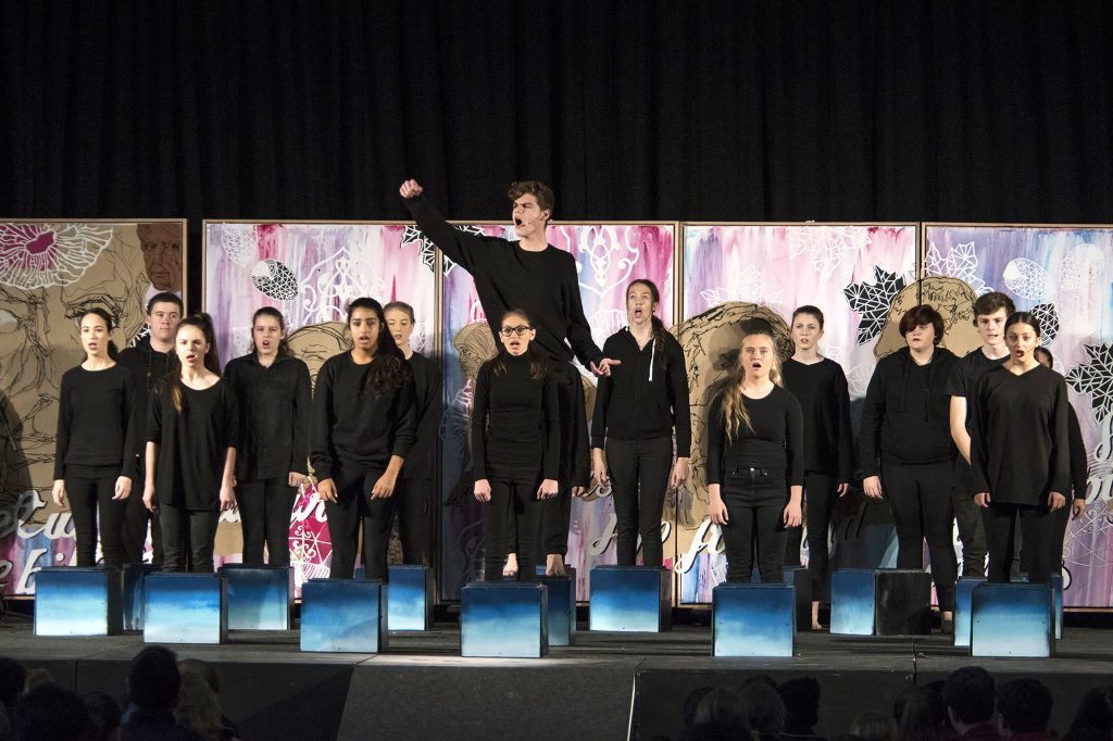 Mater Dei College students on stage during the school’s combined choir, art and drama performance to mark National Sorry Day. Photo: Supplied