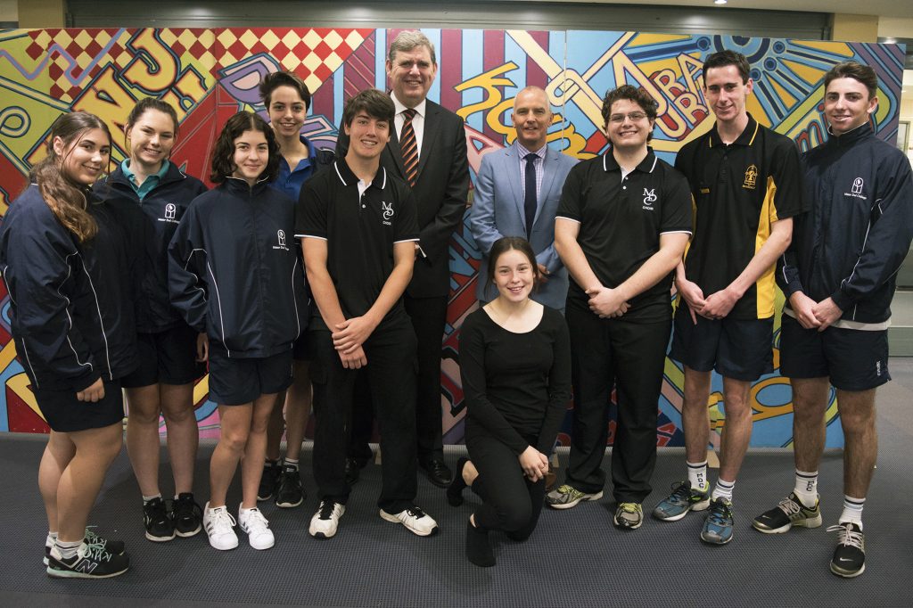 Mater Dei College art and design teacher, Toby Hurd, helped students devise and construct a 7m mural for the occasion. Photo: Supplied