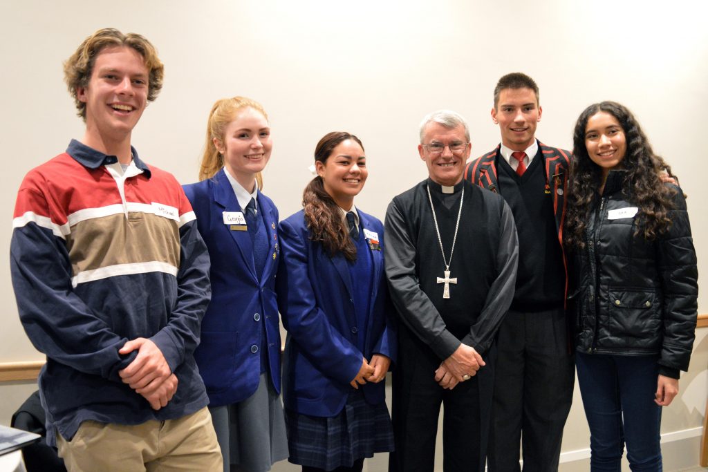 Archbishop Timothy Costelloe SDB, pictured with representatives from John XXIII College, Newman College, Aquinas College, Aranmore College and Santa Maria College, after the dinner and Q&A session hosted by the St Joseph’s Church Subiaco Youth Group. Photo: Feby Plando