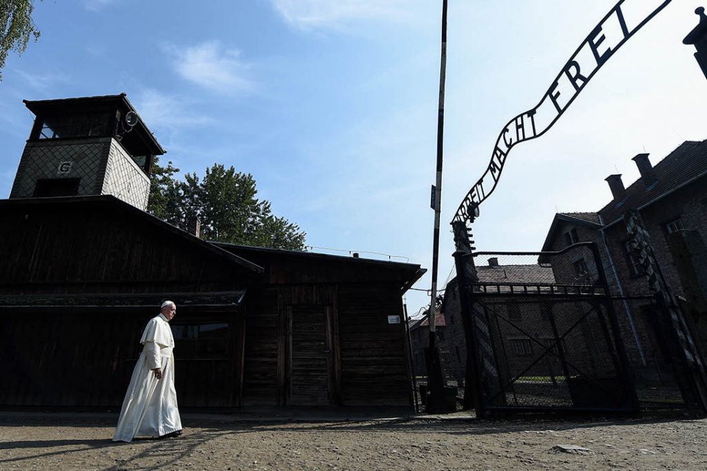 Pope Francis enters the main gate of the Auschwitz Nazi death camp in Oswiecim, Poland, July 29. Photo: CNS/Alessia Giuliani.