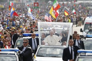 Pope Francis greets the crowd as he arrives to celebrate the closing Mass of World Youth Day at Campus Misericordiae in Krakow, Poland, July 31. (CNS photo/Paul Haring) See POPE-POLAND-WYD-MASS July 31, 2016.