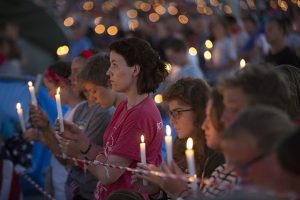 World Youth Day pilgrims hold candles during eucharistic adoration with Pope Francis at the July 30 prayer vigil at the Field of Mercy in Krakow, Poland. (CNS photo/Jaclyn Lippelmann, Catholic Standard) See POPE-POLAND-WYD-VIGIL July 30, 2016.