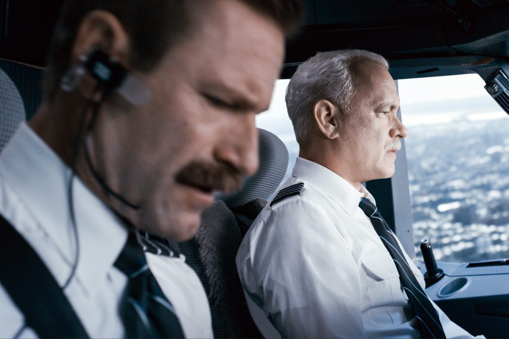 Arron Eckhart and Tom Hanks star in a scene from the movie Sully. Photo: CNS/Warner Bros