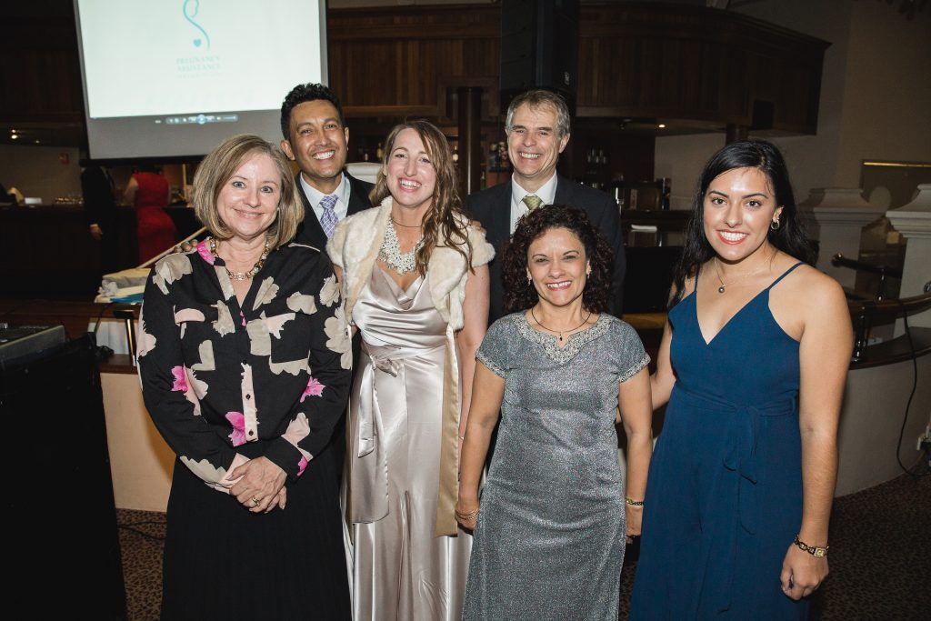 (left to right) Pregnancy Assistance Founding Member Sharon Balsarini; Eugene Wynyard with his wife, Coordinator Lara Wynyard; Chairman Eric Jas; Mercedes College student Jackie Stacey and her daughter Shanice at the Pregnancy Assistance 20th Anniversary Gala Dinner. Photo: Monica Defendi Photography