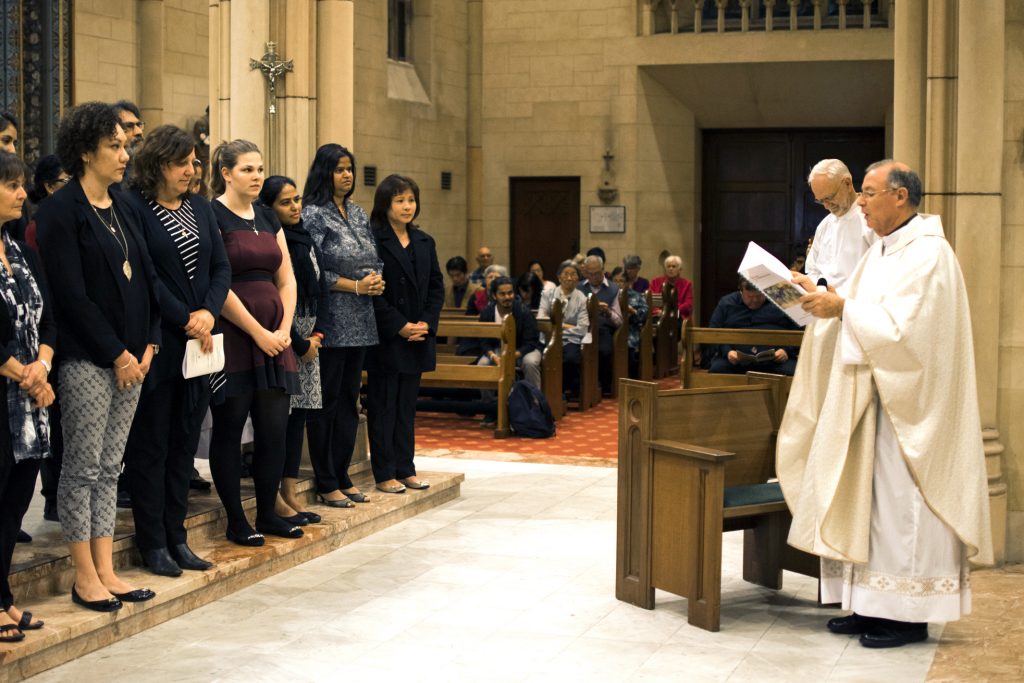 Vicar General Father Peter Whitely commissions 45 catechists during the Eucharist for Catechists at St Michael the Archangel Chapel in Leederville on the evening of Tuesday, 11 October. Photo: Jesse Roberts