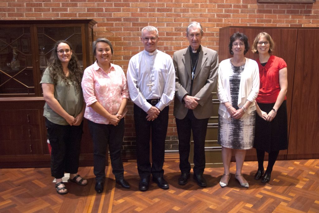 2015 BJ Hickey Scholarship Recipients Laura Firth and Gem Oliveiro and Helen Vester with Archbishop Timothy Costelloe, Emeritus Archbishop Barry Hickey and Centre for Faith Enrichment Director, Michelle Jones. Photo: Jamie O’Brien