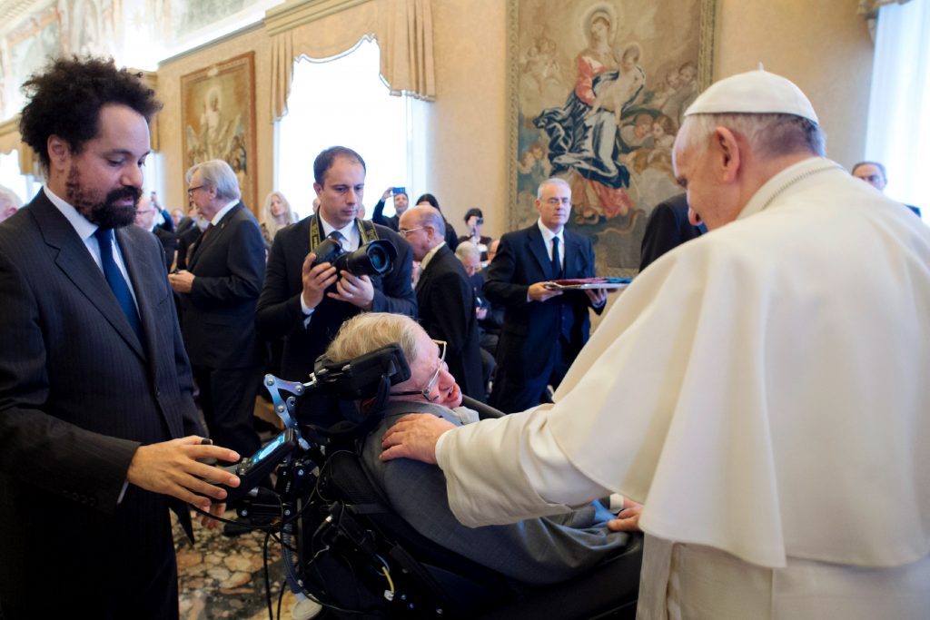 Pope Francis greets British theoretical physicist and cosmologist Stephen Hawking, during an audience with participants attending a plenary session of the Pontifical Academy of Sciences at the Vatican on 28 November. Photo: CNS /L'Osservatore Romano