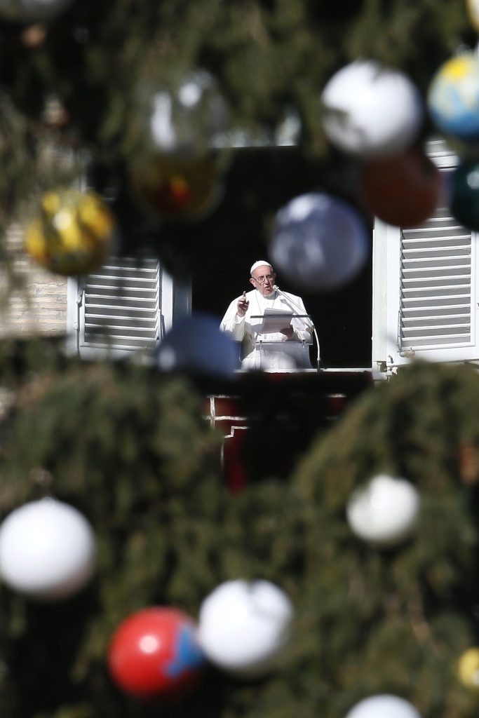 Pope Francis leads the Angelus from his studio overlooking St Peter's Square at the Vatican on 6 January, the feast of the Epiphany. Photo: CNS/Paul Haring