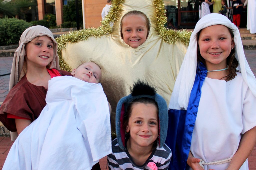 Children from Our Lady of Lourdes parish used drama to tell the nativity story at an open-air Mass held at Kolbe Catholic College on Christmas Eve. Photo: Supplied