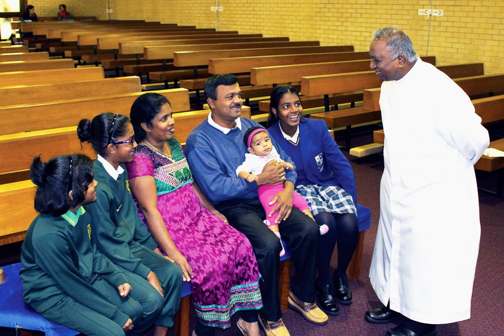 The Jesuthasan family, father Rayappan and his wife Kalpana, together with their three daughters, fled their home in Colombo, Sri Lanka, to escape persecution and to find a better future for their family. They are now a thriving family of the Lynwood/Langford parish, thanks to the support of Parish Priest, Fr Terry Raj, and Principal, Lyn Stone. Photo: Michelle Ebbs