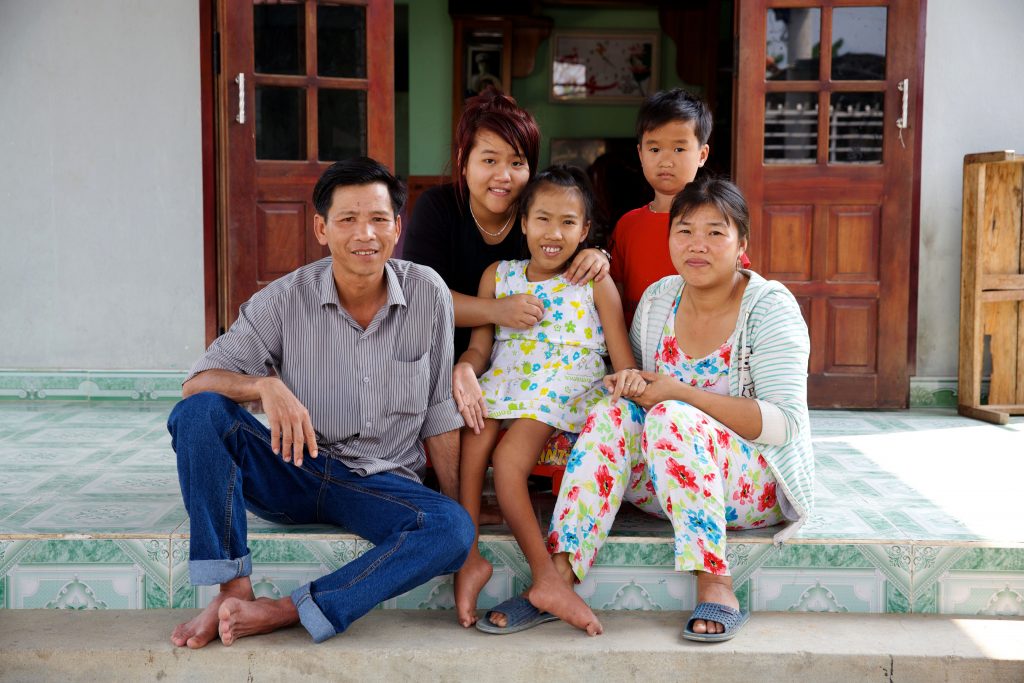 Nguyet (15) lives in Quang Nam province in central Vietnam with her mum Tim, father Nhuan, sister Thuy (19) and brother Toan (9). Photo: Richard Wainwright/Caritas Australia