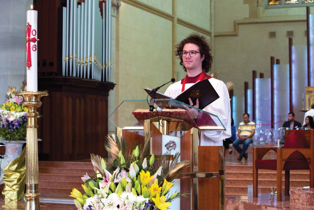 Joshua Adams leads the congregation at the 2016 Easter Vigil. Photo: Ron Tan