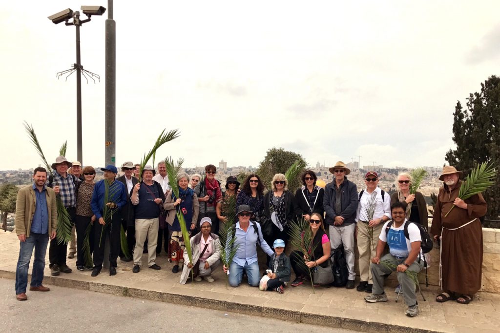 The Tantur group with Perth Auxiliary Bishop Don Sproxton (sixth from left) at the Palm Sunday Procession at the Mount of Olives. Photo: Gemma Thompson