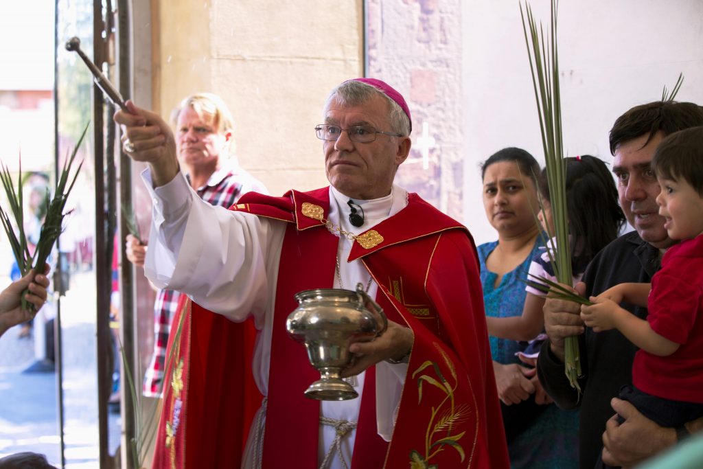 Followers of Jesus are invited to follow his journey – first into Jerusalem and then to Calvary – Archbishop Timothy Costelloe told the congregation that gathered at St Mary’s Cathedral for Palm Sunday last week. Photo: Ron Tan