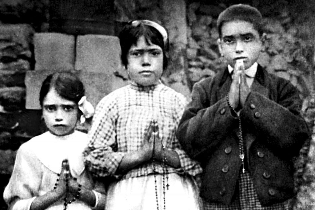 Portuguese shepherd children Lucia dos Santos (centre) and her cousins, Jacinta and Francisco Marto, are seen in a file photo taken around the time of the 1917 apparitions of Mary at Fatima. Photo: CNS/EPA.