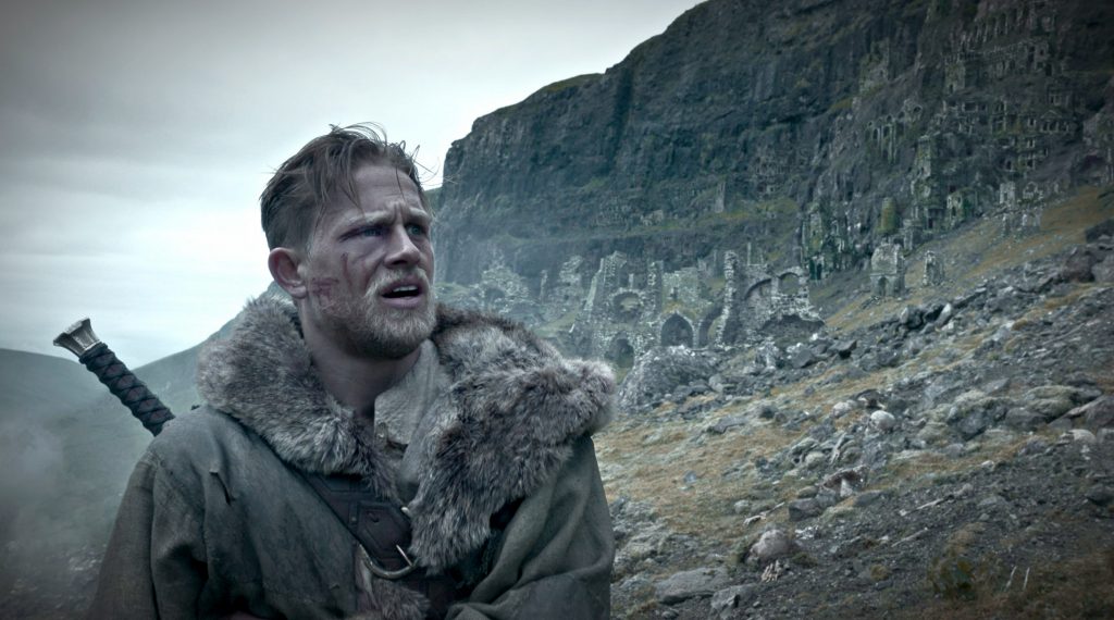 Charlie Hunnman stars in a scene from the movie "King Arthur: Legend of the Sword." Photo: CNS/Warner Bros.