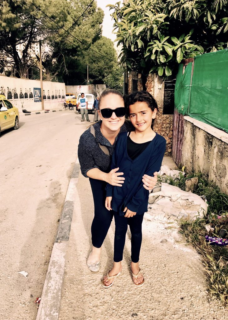 Perth pilgrim, Gemma Thomson, with a local refugee at Aida Refugee Camp in Bethlehem. Photo: Gemma Thomson.