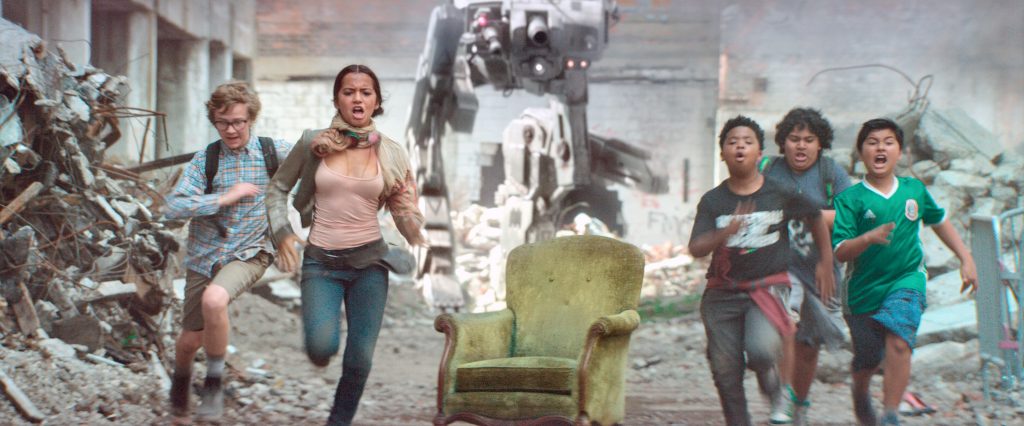 Samuel Parker, Isabela Moner, Benjamin Flores Jr, Juliocesar Chavez and Daniel Iturriaga star in a scene from the movie "Transformers: The Last Knight." Photo: CNS/Paramount.