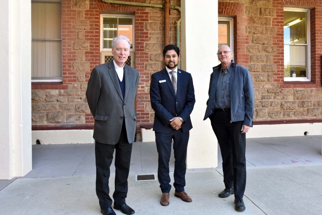 Bishop Don Sproxton with Principal Troy Hayter and first Principal of Clontarf, Br Kevin Ryan touring the Campus on the last day of RE week. Photo: Natashya Fernandez.