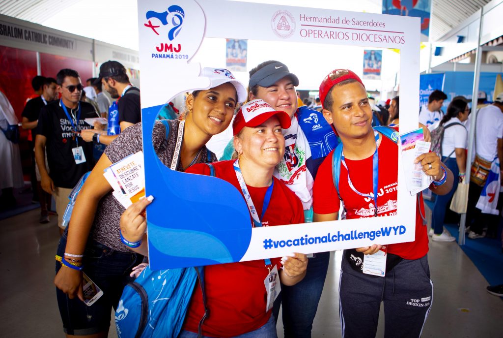 World Youth Day pilgrims from the Dominican Republic pose for a photo on 24 January 2019, at a vocations festival in a Panama City park, where they learned what different religious communities have to offer. Photo: Chaz Muth/CNS.