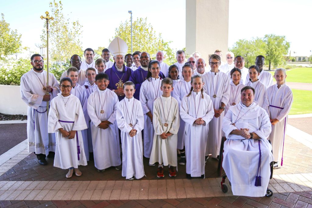 Emeritus Archbishop Barry Hickey with acolytes and altar servers from St Helena of the Holy Cross, Ellenbrook Parish, on the occasion of them parish becoming a members of the Guild of St Stephen continuing a history of service to the sacraments that goes back to the beginning of last century. Photo: Eric Martin.