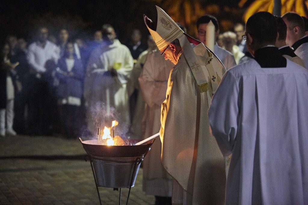 Perth Archbishop Timothy Costelloe SDB administering the Blessing of Fire during the Easter Vigil Mass held at St Mary’s Cathedral on 20 April. Photo: Ron Tan.