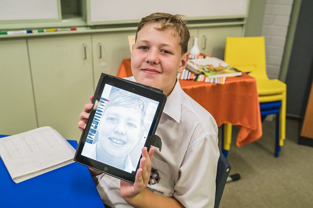 Corpus Christi Year 7 and 8 Education Support students have the opportunity to teach older students with disability and college staff as part of the Digital Creativity course. Photo: Clare Pickersgill.