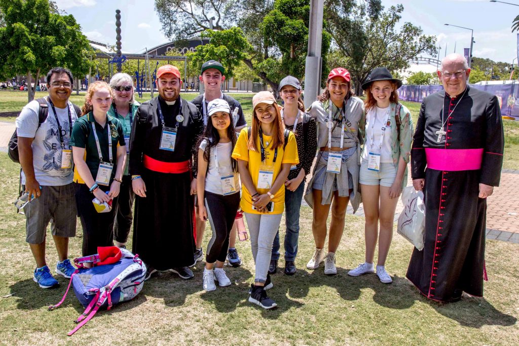 In his 2019 Easter message, Bunbury Bishop Gerard Holohan says the trials of all of us are the trials of Christ. Bishop Holohan is pictured with youth from the Diocese of Bunbury at the 2017 ACYF. Photo: Jamie O’Brien. 