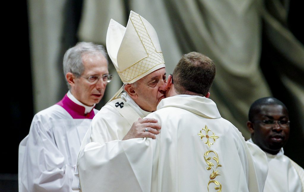 Pope Francis kisses a newly ordained priest during a Mass in St Peter's Basilica at the Vatican on 12 May 2019. The Holy Father ordained 19 new priests. Photo: Yara Nardi/Reuters.