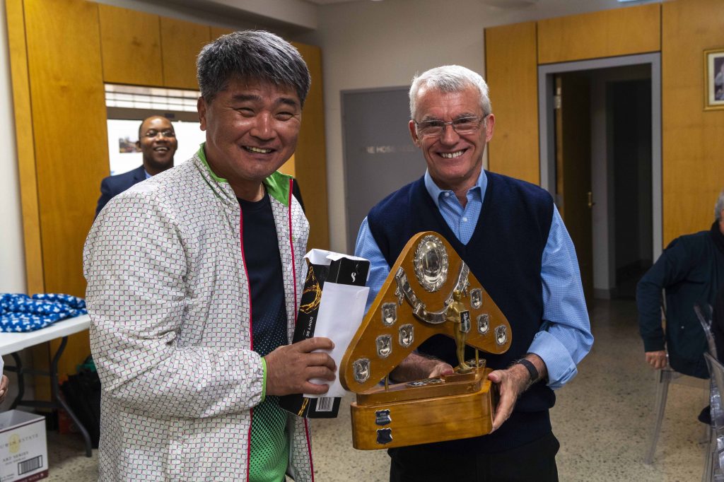 Archbishop Timothy Costelloe presents The Clergy Golf Cup to this year’s tournament winner, Fr Benedict Lee. Photo: Josh Low.