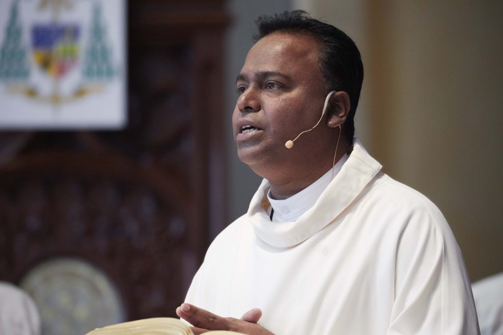 The Mass was celebrated by Rev Fr Ajith Perera, from Sri Lanka. Photo: Ron Tan