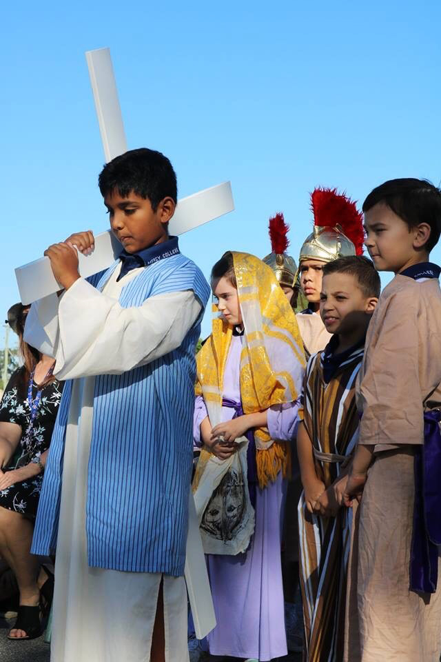 Mercy College Year 3 Chi students re-enact the Stations of the Cross on Good Friday, 19 April. Photo: Supplied.